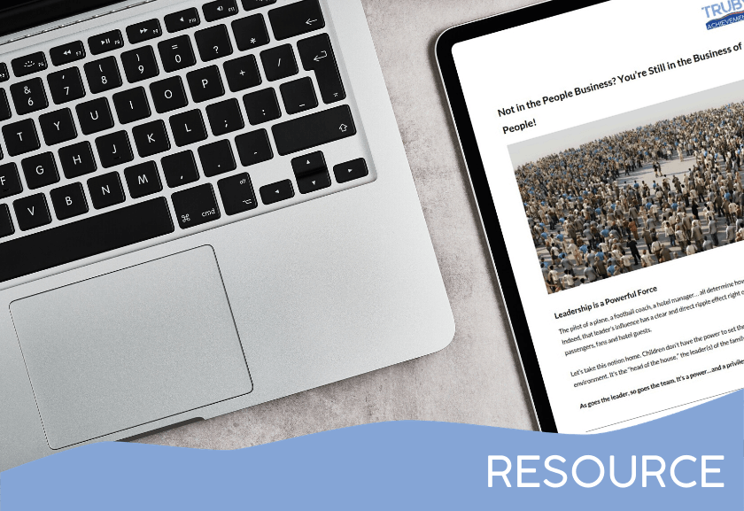 tablet showing the article next to a computer - featured image for Not in the People Business? - Article by Truby Achievements (pdf version)